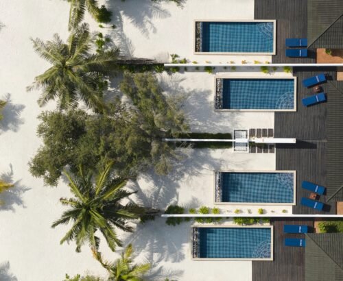 Villa Nautica - Sunset Deluxe Beach Pool Villa - Poolside Aerial 1 - 4K