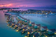 HRHM-Aerial-Sunset-WaterBungalows